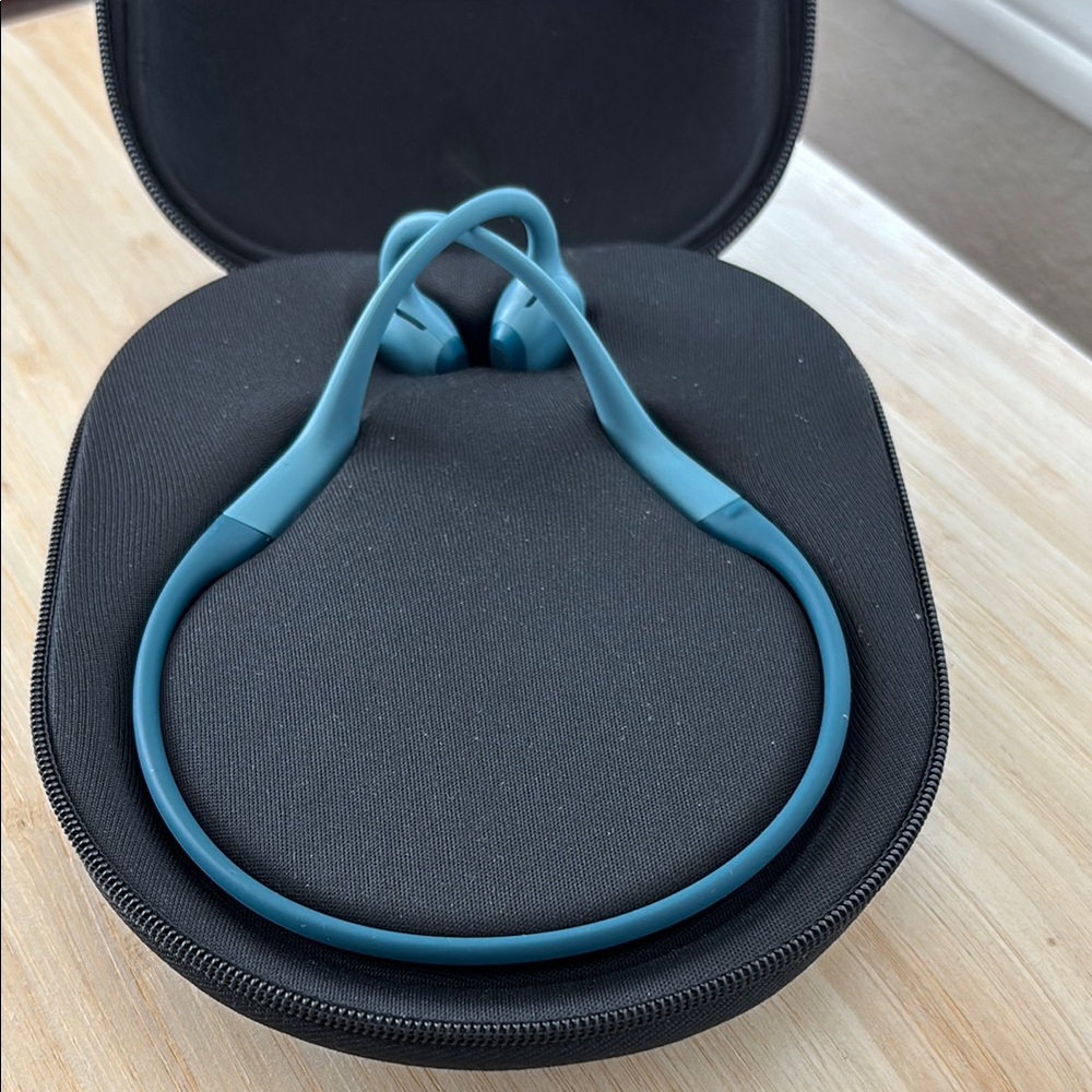 Shokz Light Blue OpenRun Pro Headphones with Hard Case